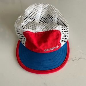 Men’s Patagonia duck bill running hat. Red and Blue